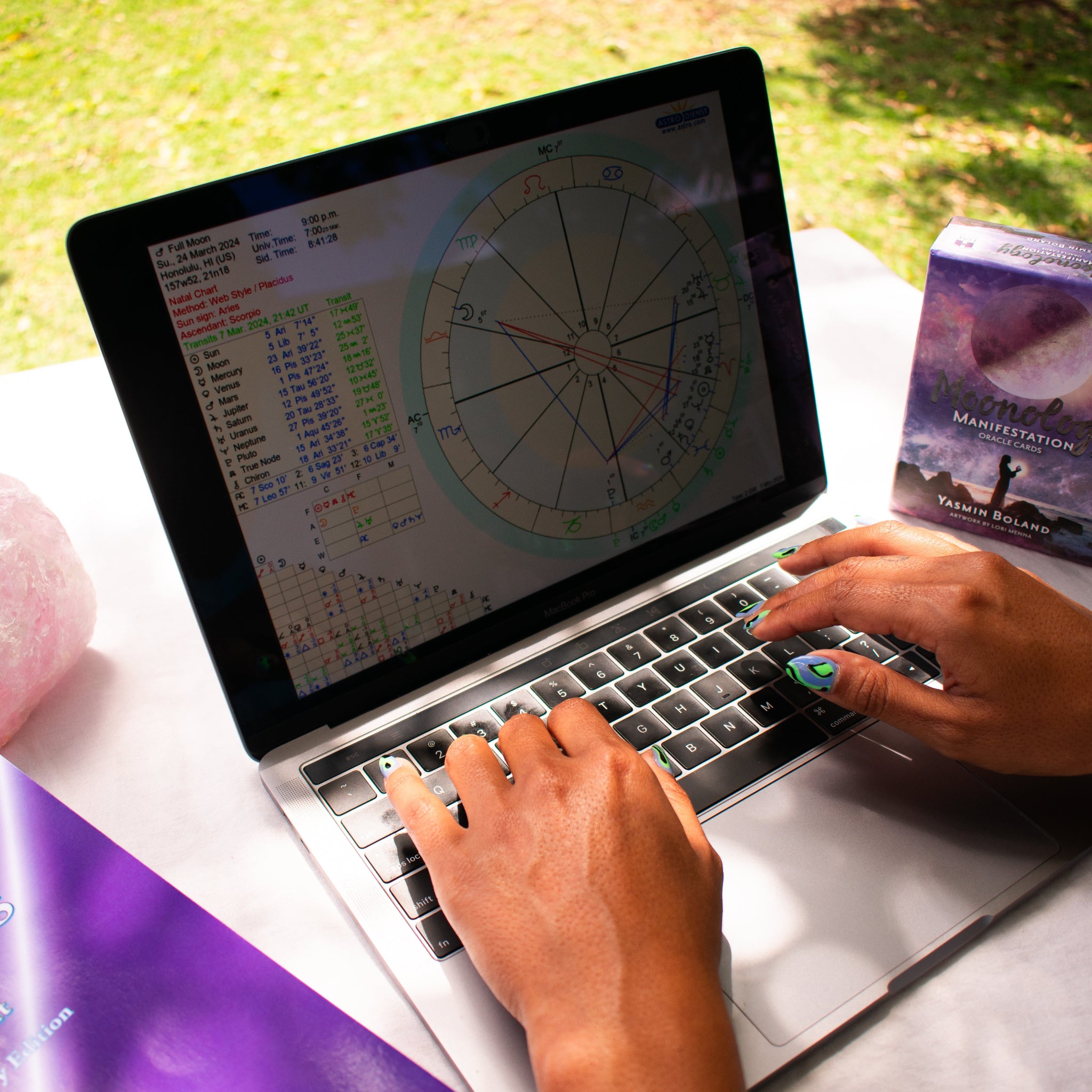 An online astrology reading service is displayed on a computer screen