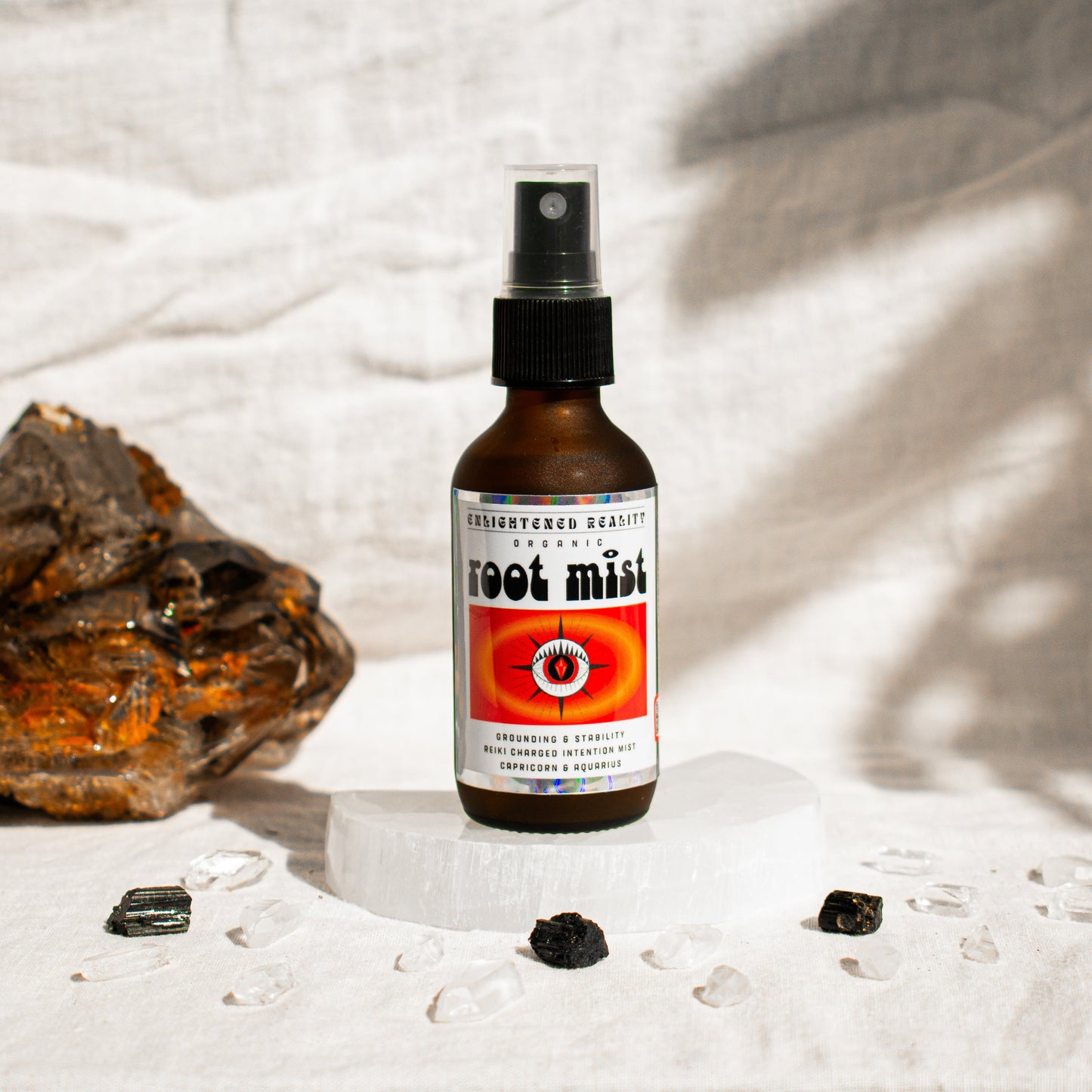 Organic Root Chakra Mist for Capricorn and Aquarius zodiac energy, promoting grounding, stability, and connection to Earth