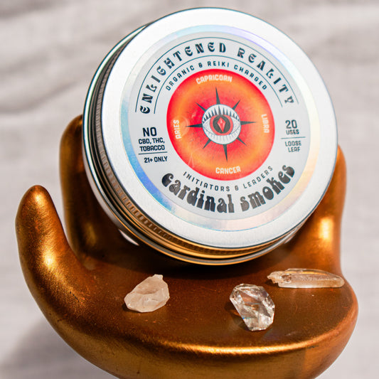 Close-up of Organic Herbal Smoking Blend in metal tin with crystal altar setup for ritual use
