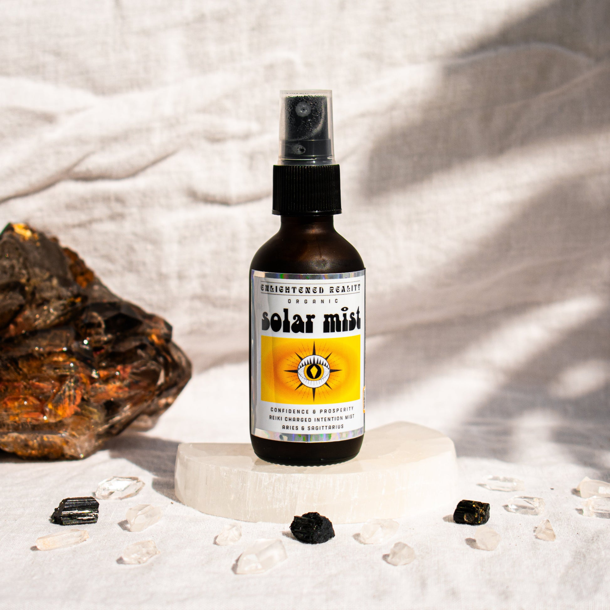 Organic chakra mist spray bottle for meditation and energy cleansing by Enlightened Reality