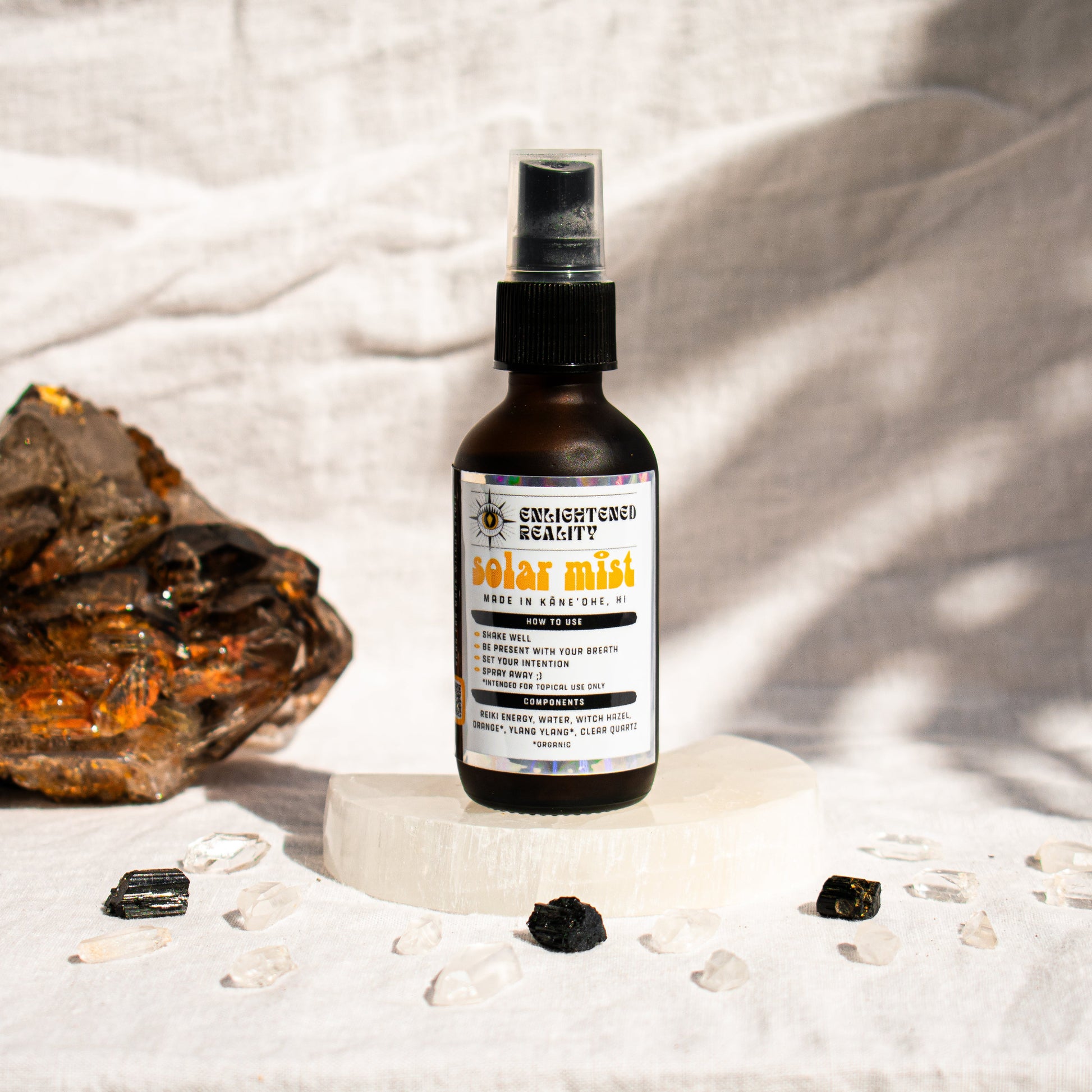 Organic chakra mist spray bottle for meditation and energy cleansing by Enlightened Reality