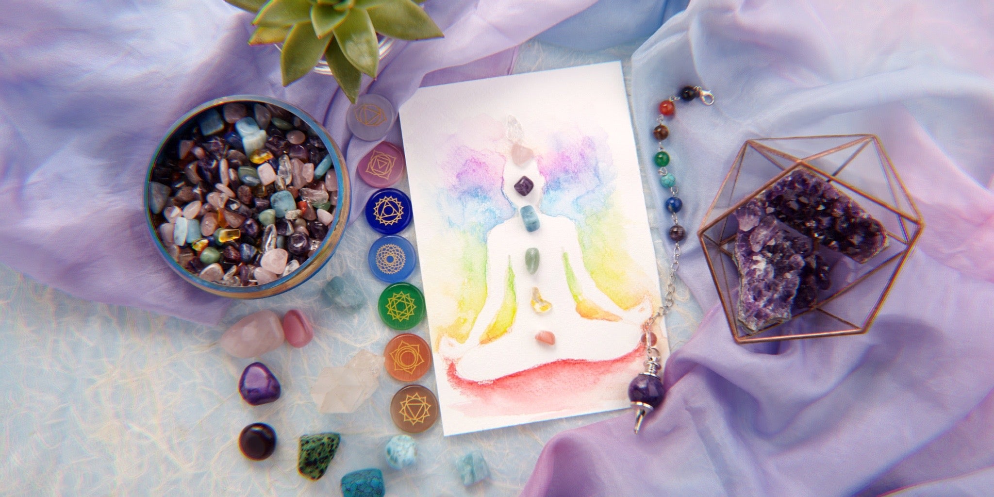 Image of a reiki chart and chakra stones