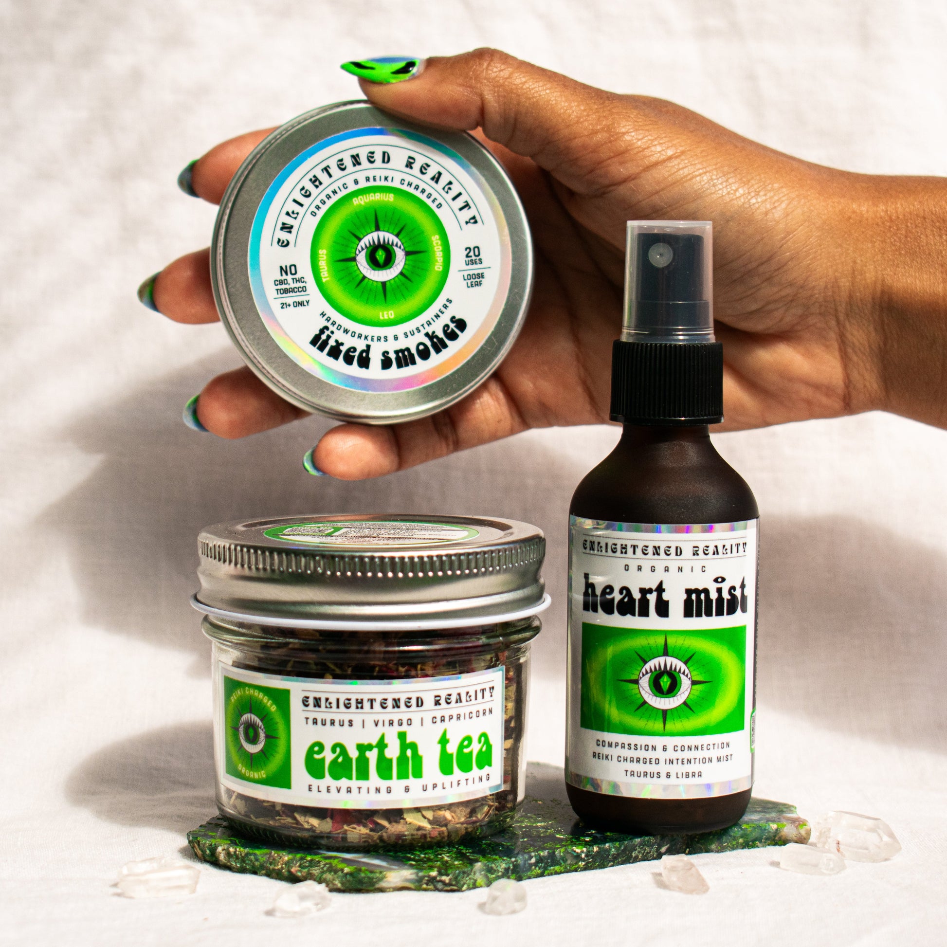 Organic Taurus Zodiac Ritual Bundle featuring Heart Chakra Mist, Earth Element Tea, and Fixed Smoking Blend with crystal altar