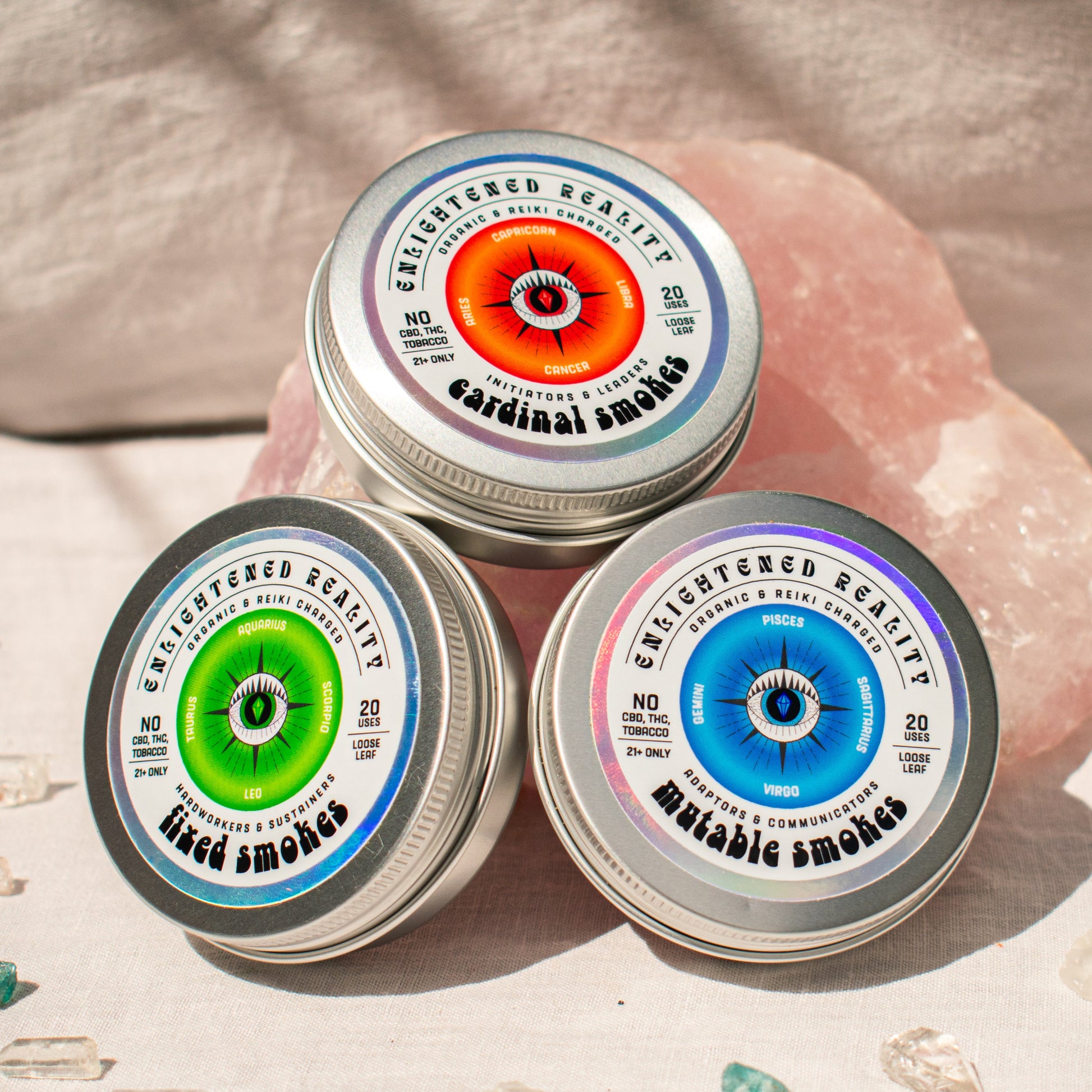 Trio of Organic Herbal Smoking Blends displayed on pink Himalayan salt rock for astrological and spiritual rituals