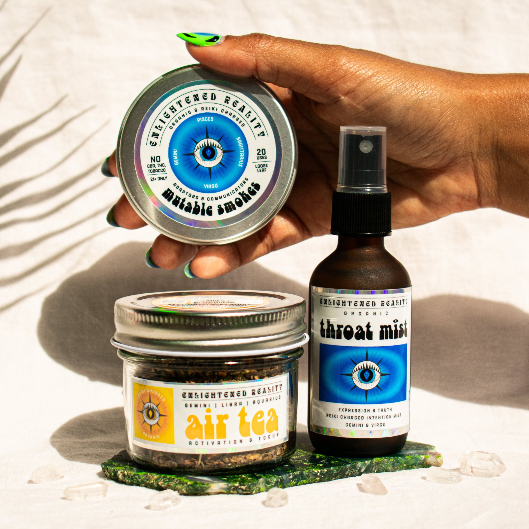 Organic Gemini Zodiac Ritual Bundle featuring Throat Chakra Mist, Air Element Tea, and Mutable Smoking Blend with crystal altar