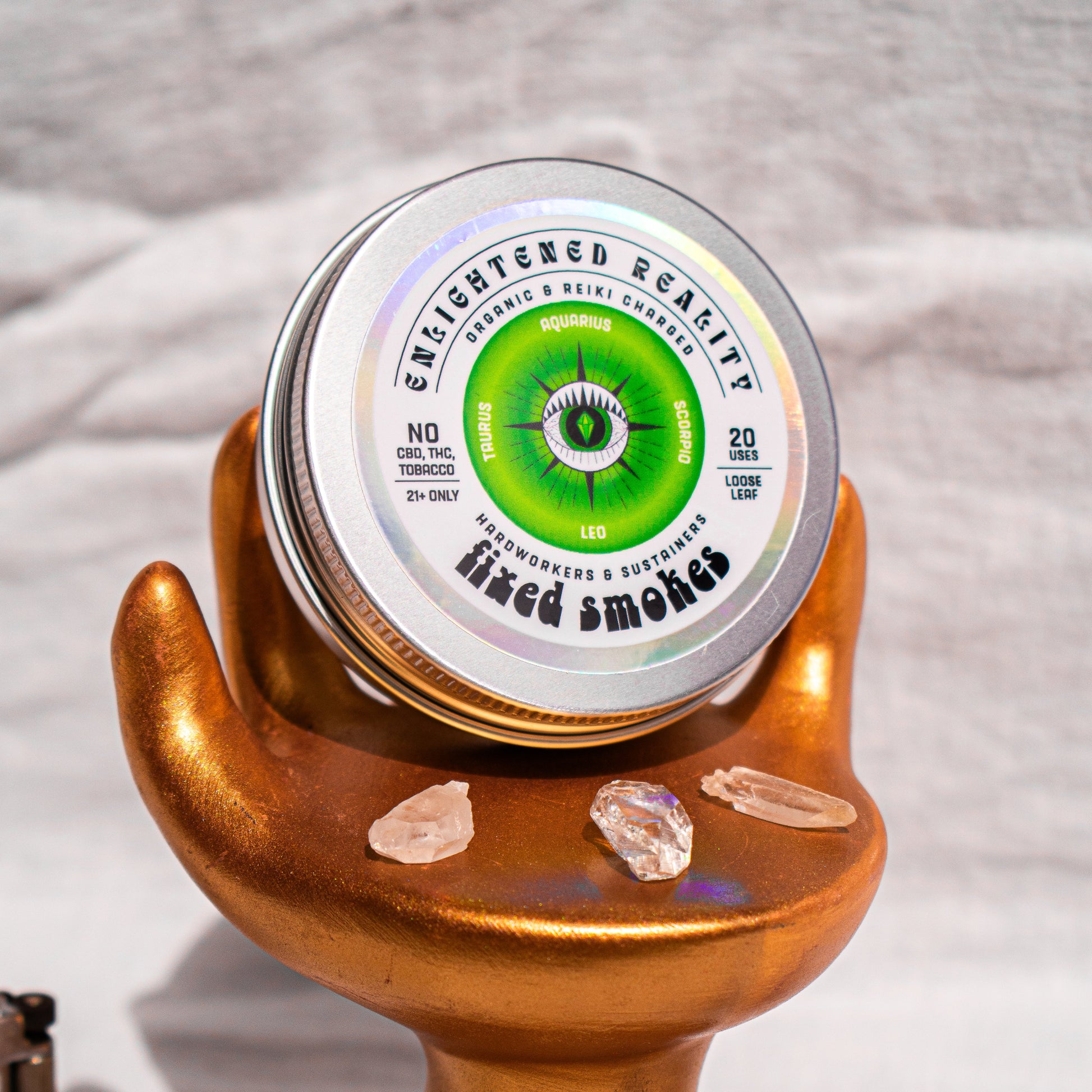 Close-up of Organic Herbal Smoking Blend in metal tin with crystal altar setup for ritual use