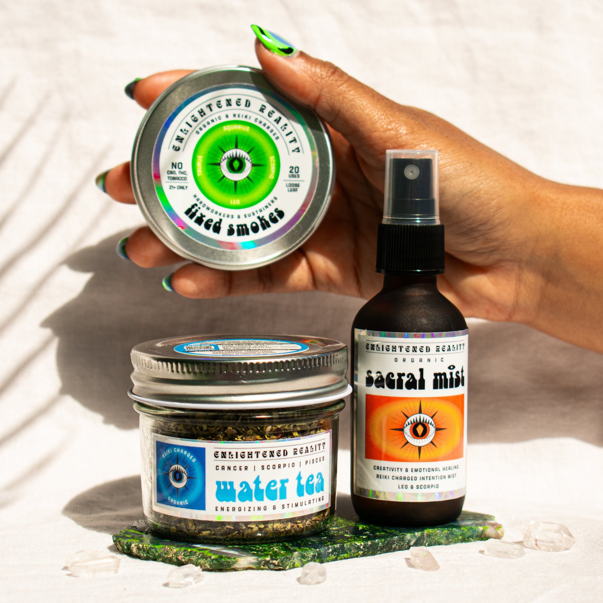 Organic Scorpio Zodiac Ritual Bundle featuring Sacral Chakra Mist, Water Element Tea, and Fixed Smoking Blend with crystal altar