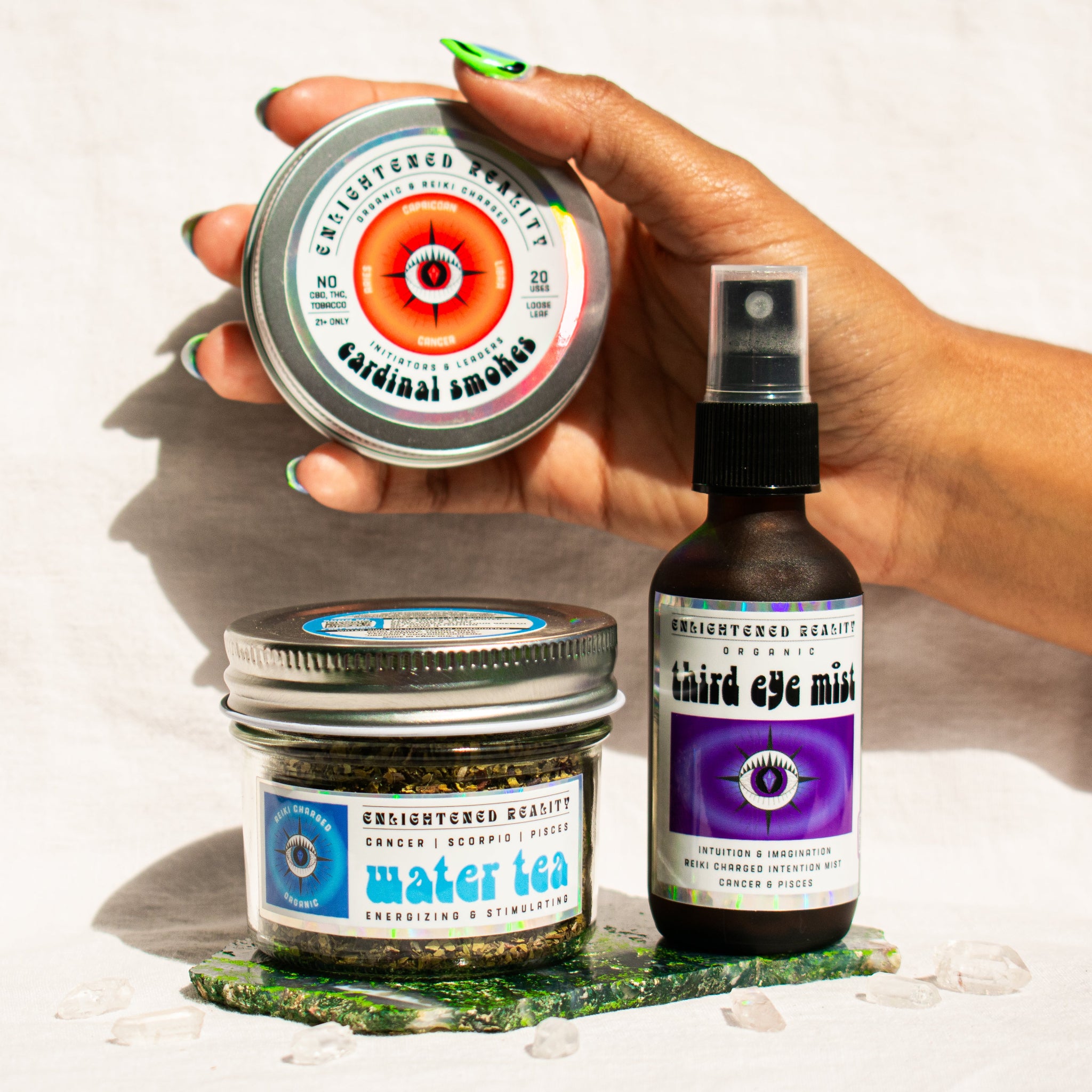 Organic Cancer Zodiac Ritual Bundle featuring Third Eye Chakra Mist, Water Element Tea, and Cardinal Smoking Blend with crystal altar