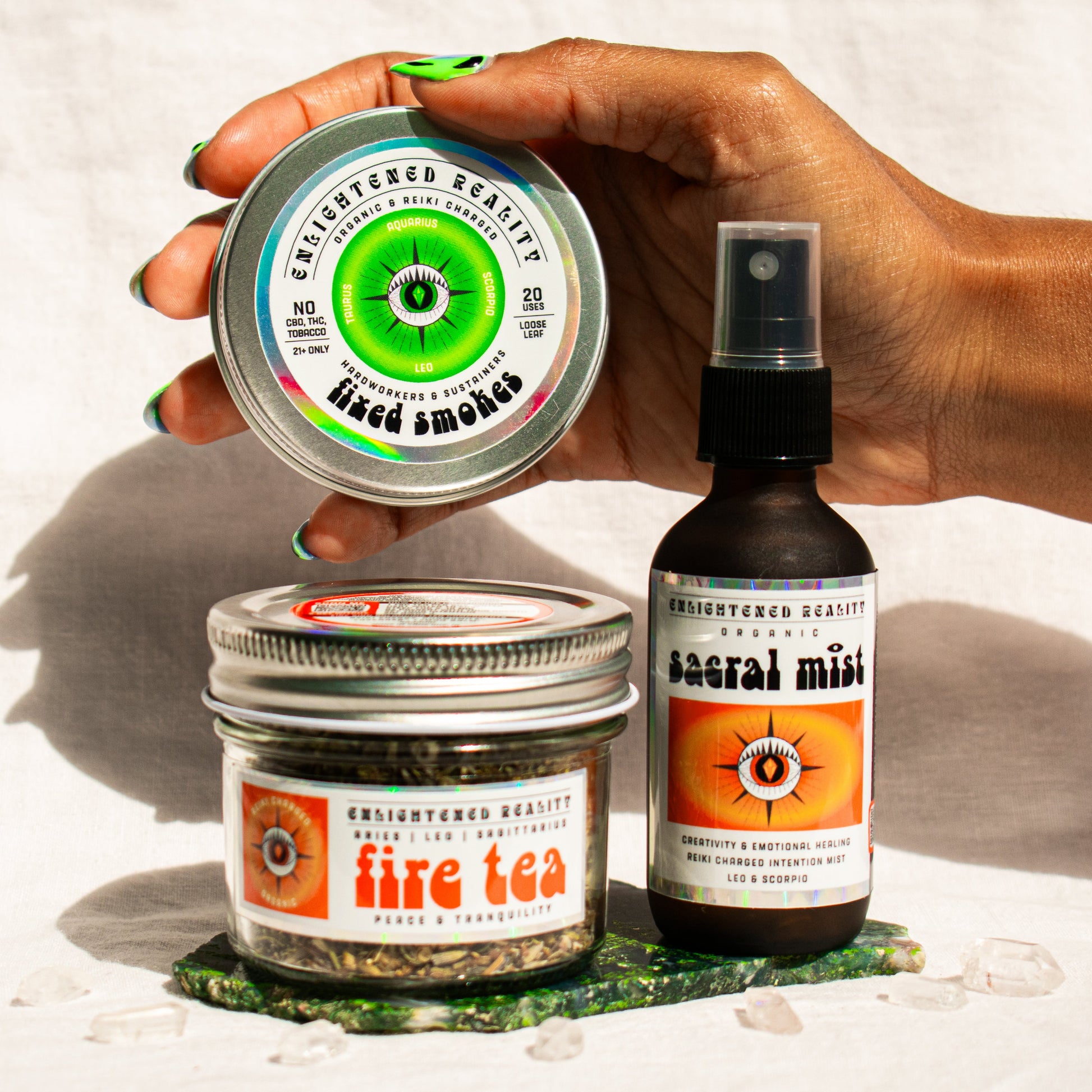 Organic Leo Zodiac Ritual Bundle featuring Sacral Chakra Mist, Fire Element Tea, and Fixed Smoking Blend with crystal altar
