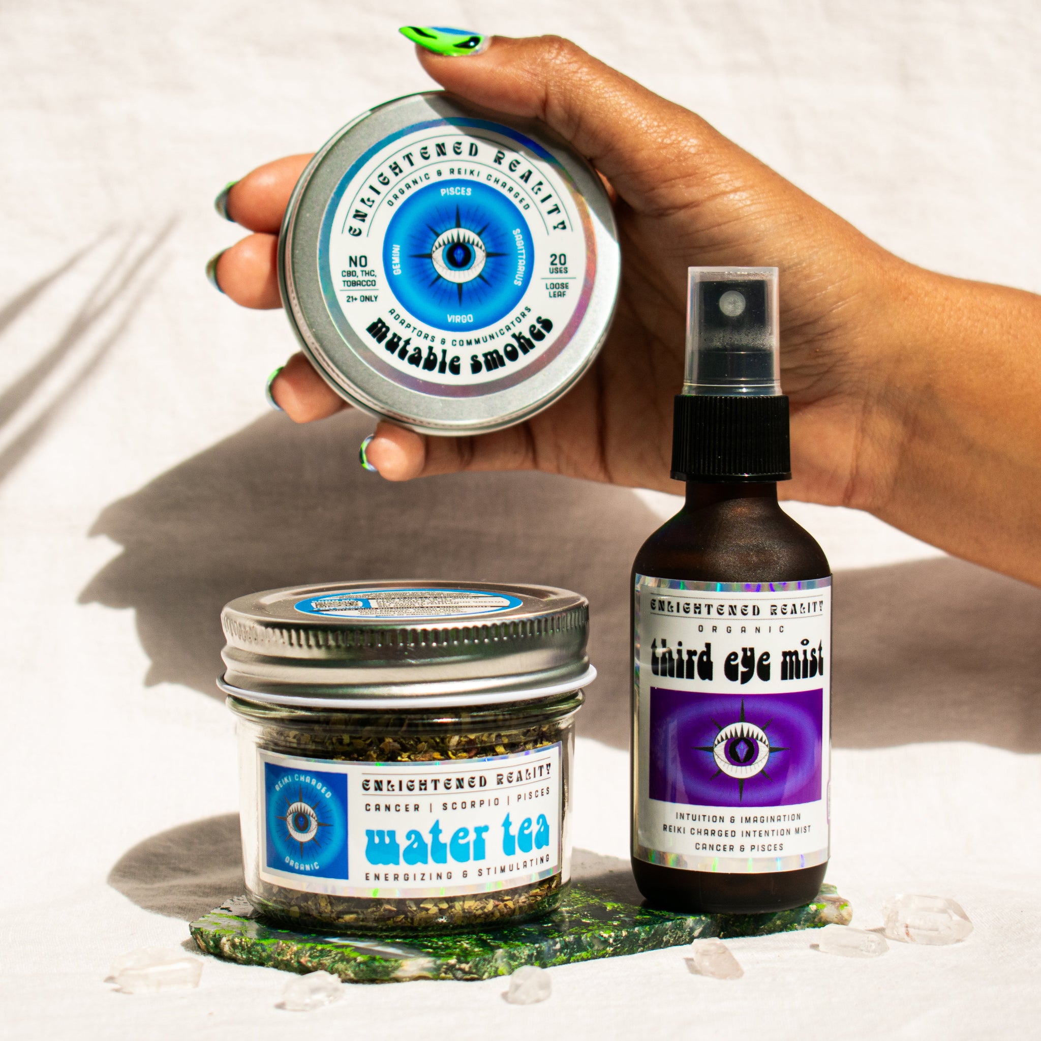 Organic Pisces Zodiac Ritual Bundle featuring Third Eye Chakra Mist, Water Element Tea, and Mutable Smoking Blend with crystal altar